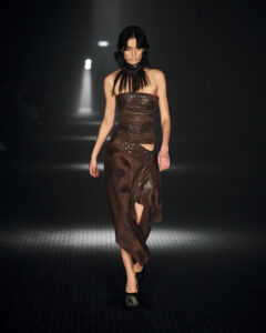 Model walking for P.L.N wearing long brown dress during Copenhagen Fashion Week AW23