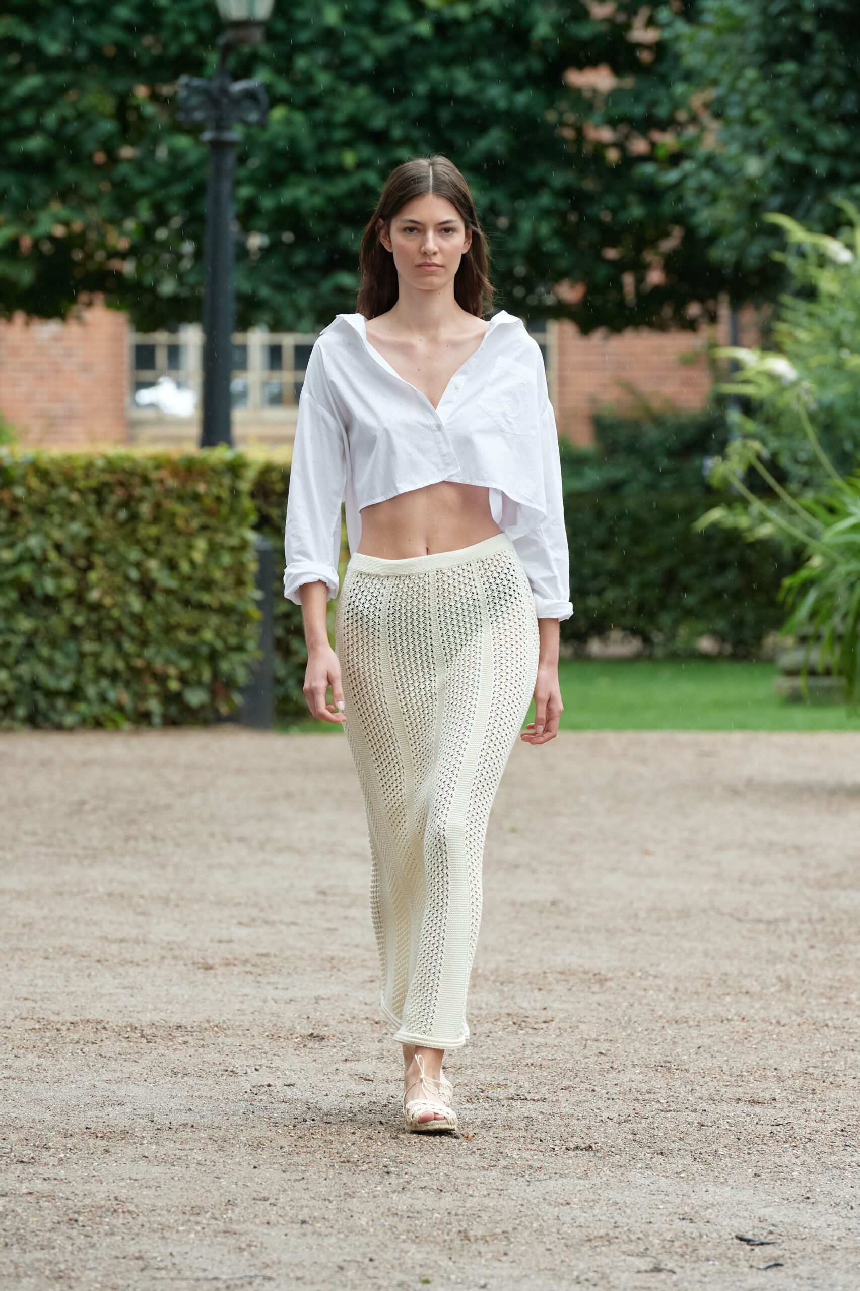 Model wearing white skirt from Skall Studio at CPFW SS24