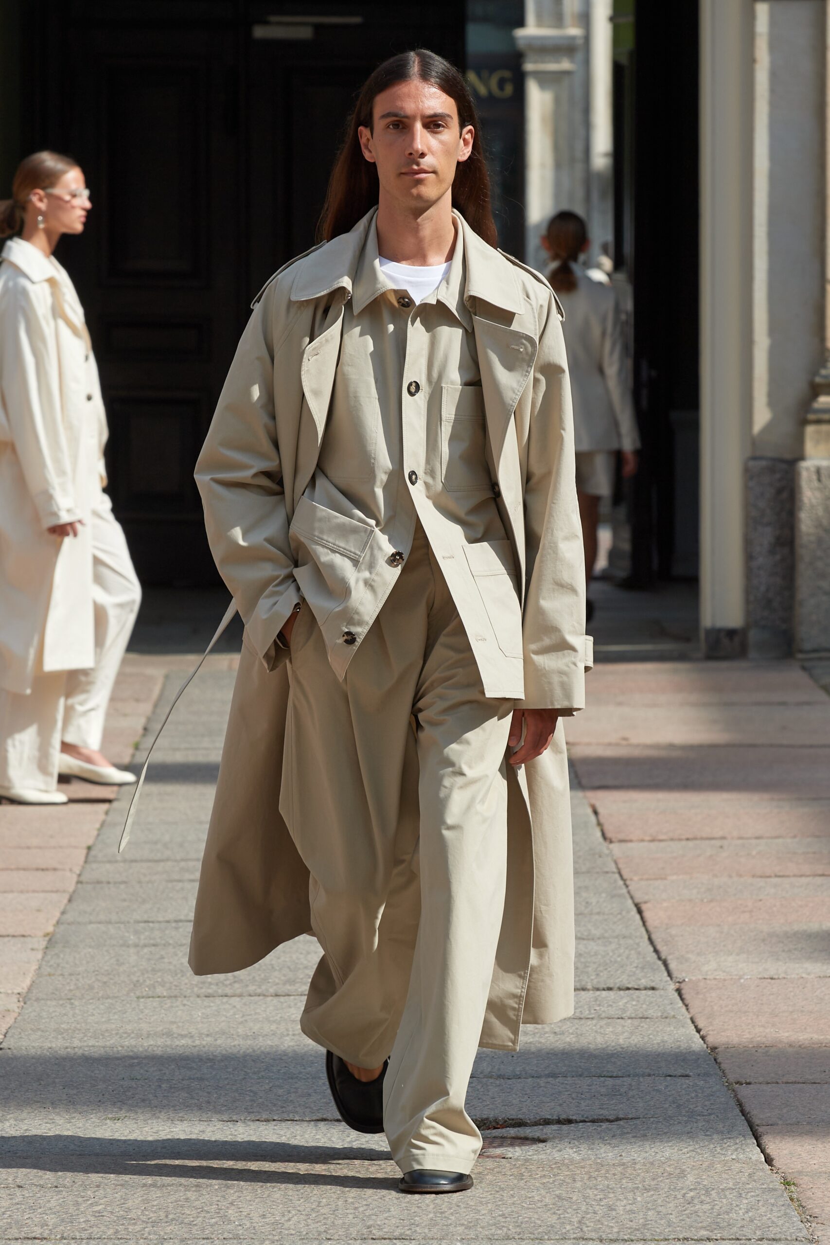 Model wearing Mark Kenly Domino Tan SS25 during Copenhagen Fashion Week